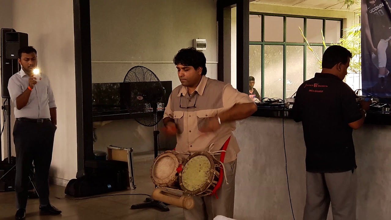 Jananath Warakagoda live performing at MAS Athena