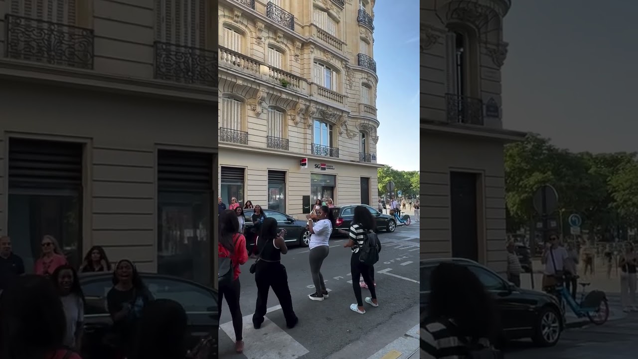 South African choir sings in the streets of Paris