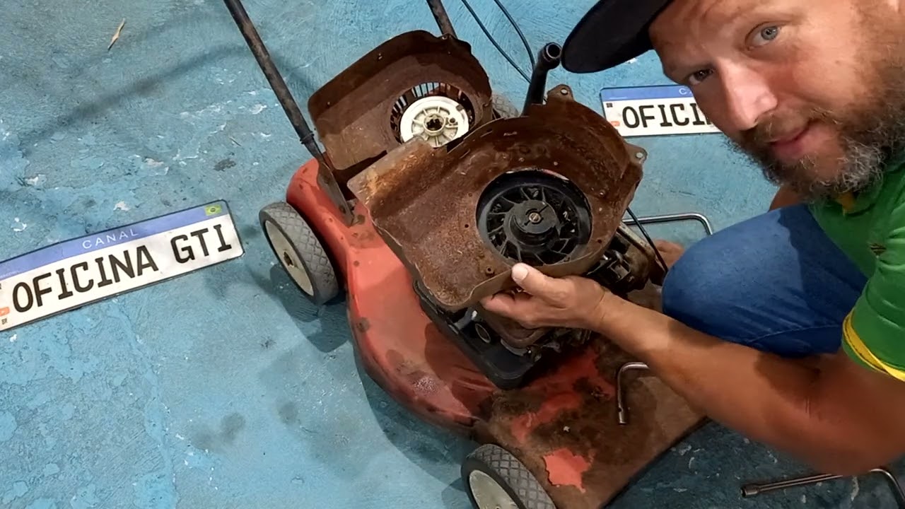 máquina  de cortar grama com sistema  de partida  retrátil  mais antigo