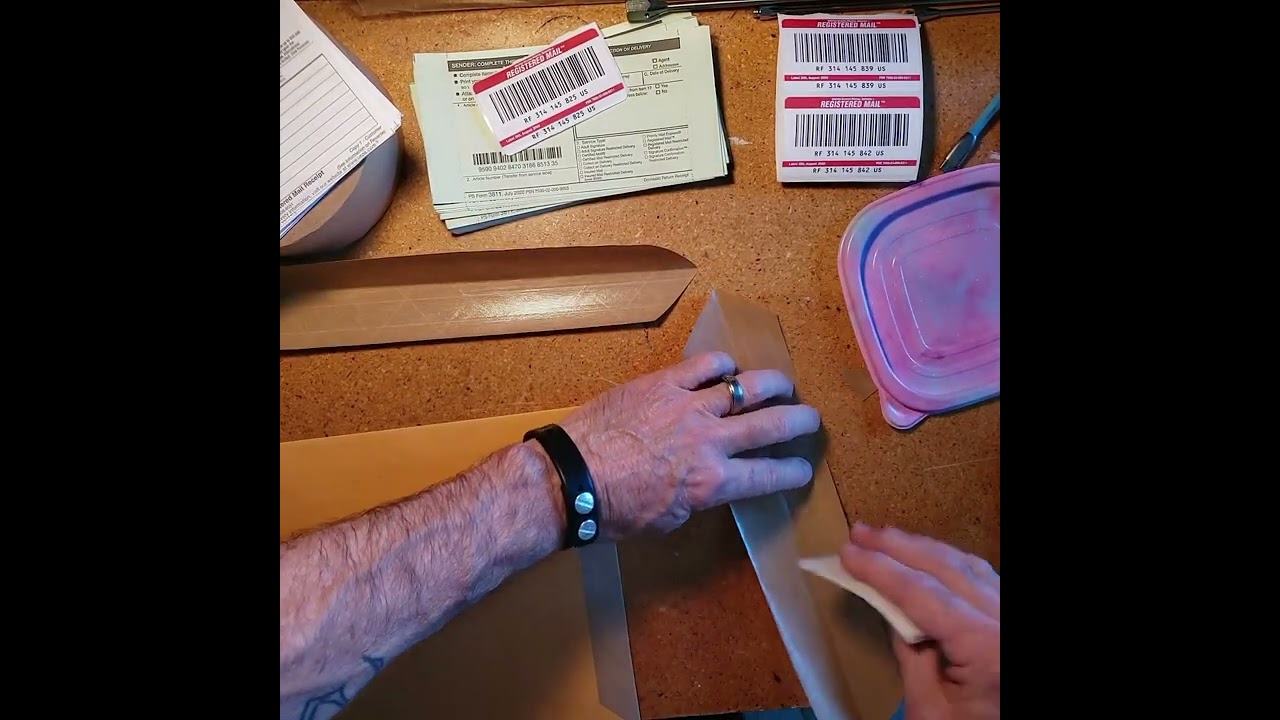 How to assemble a Registered Mail Envelope.