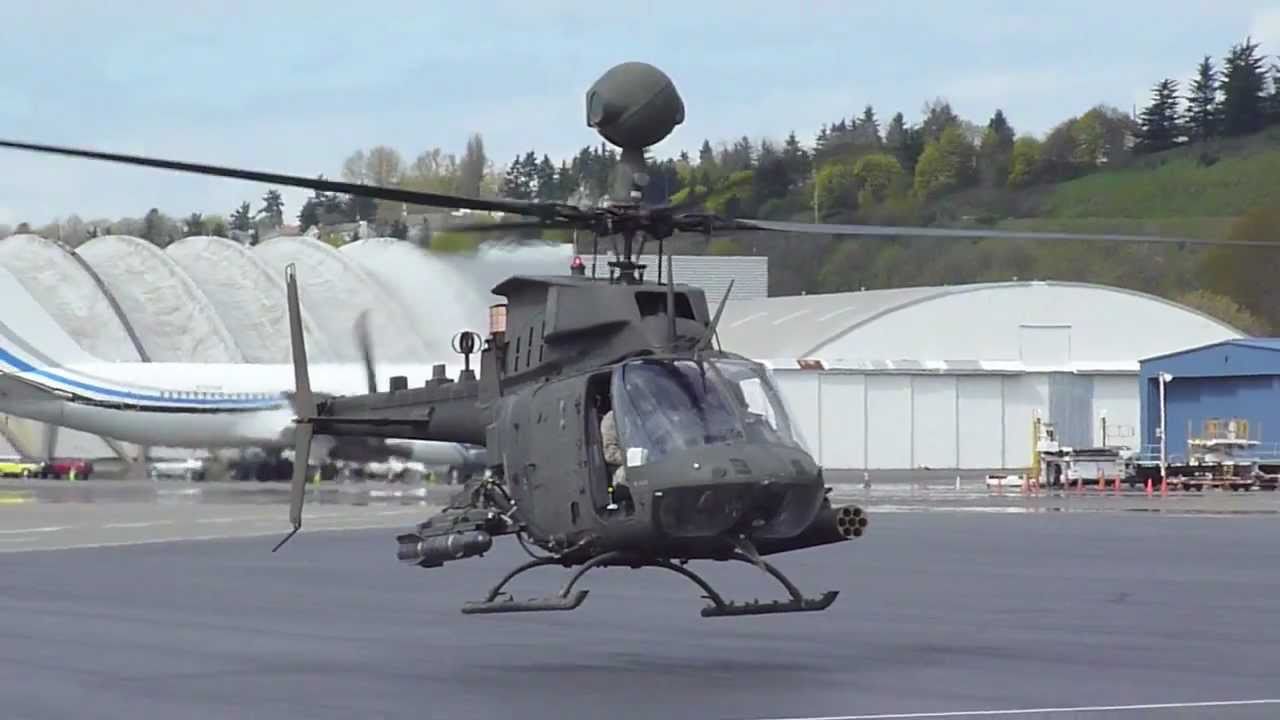 US Army Bell OH-58 Kiowa helicopter takeoff at KBFI Seattle