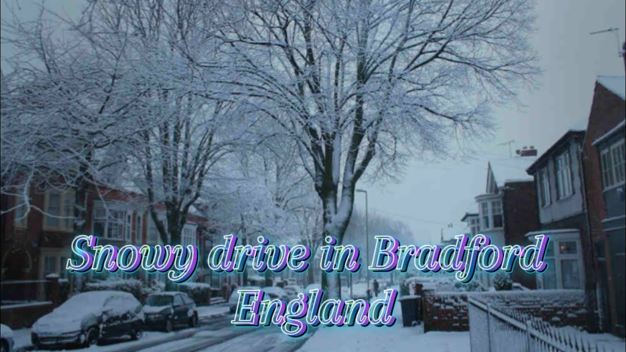 Snowy drive in Bradford through  Manchester  England