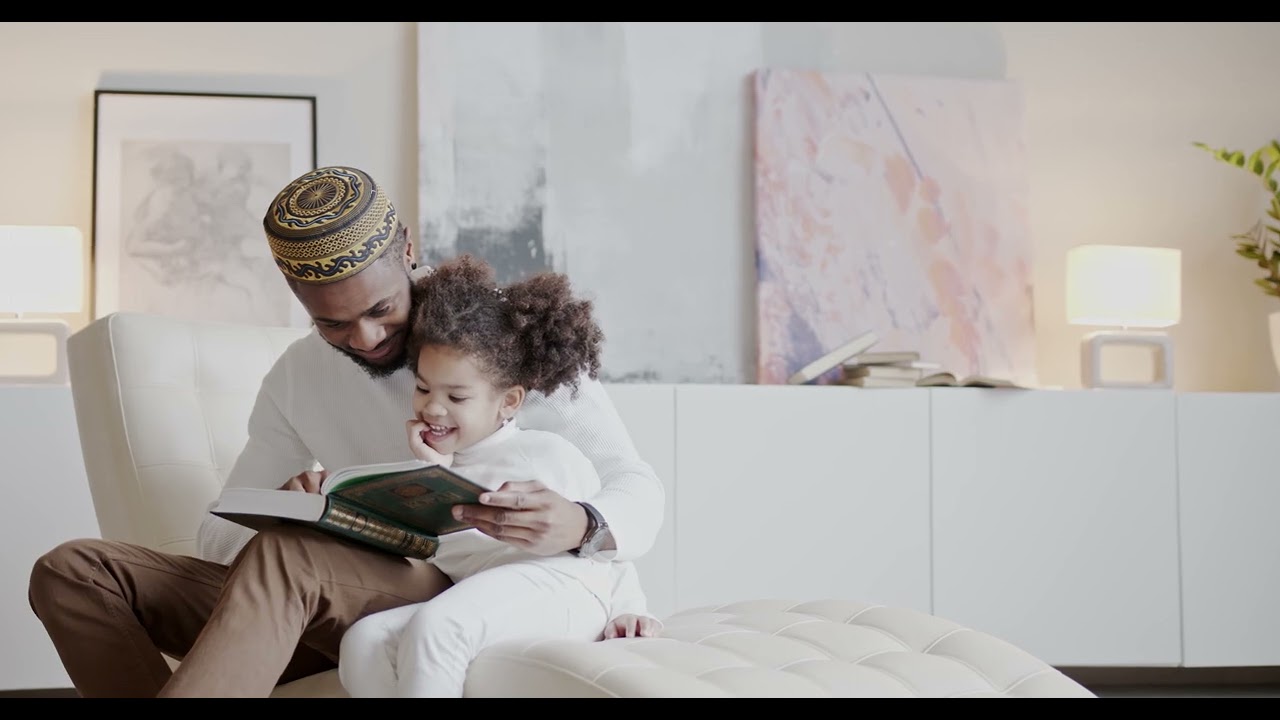 A Muslim Father Reading Holy Quran To His Daughter | 4K Free Stock Video | Royalty Free Stock Video
