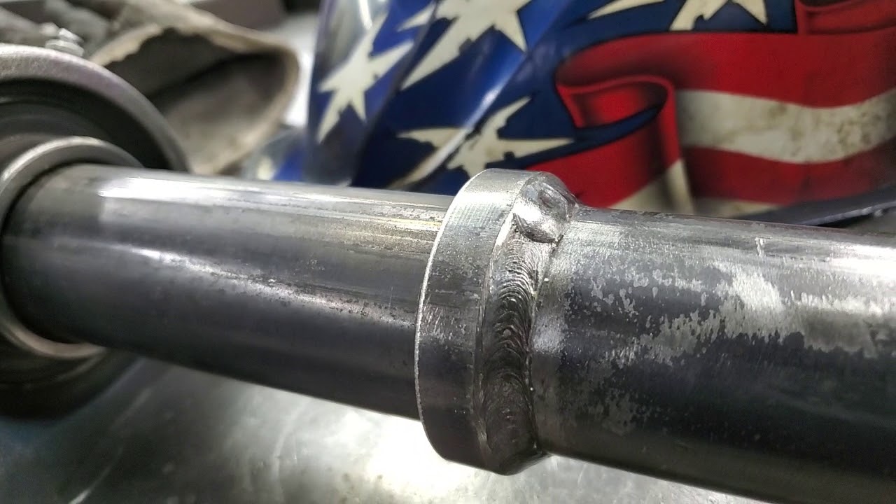 Thick Grip Dumbells welded on a Miller 255 Multimatic.