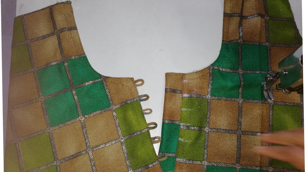 Very beautiful loops and buttons neckline design