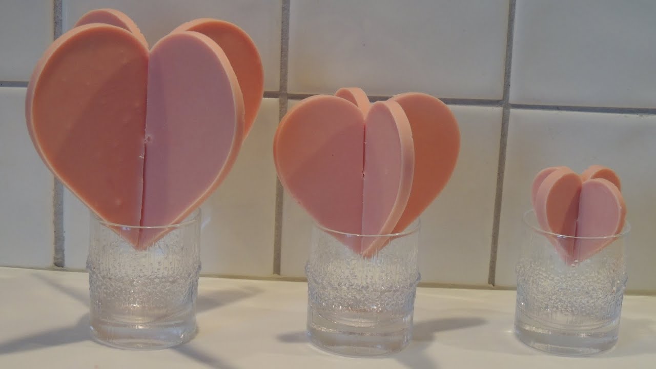 Homemade 3D pink chocolate heart for Valentine's Day in silicone mold (mould)