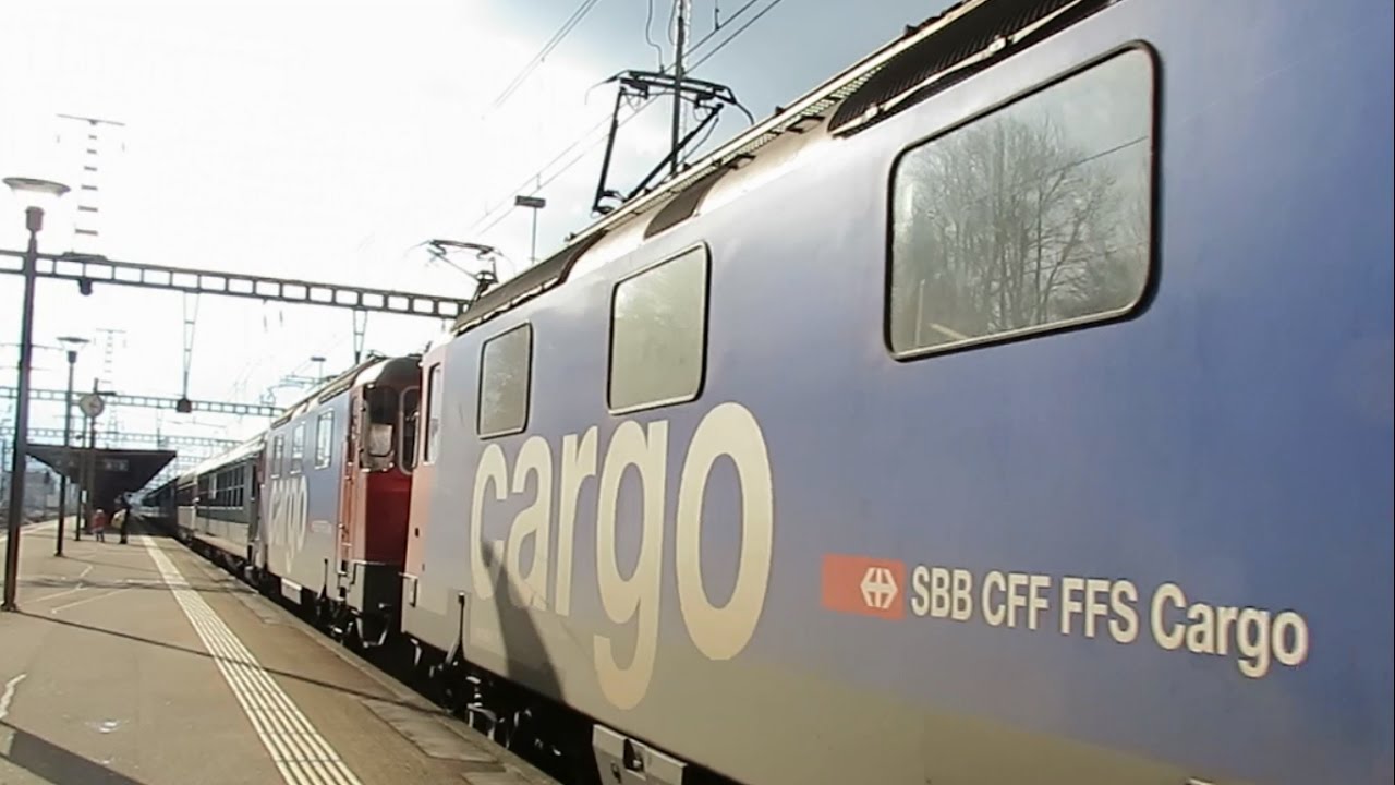 Switzerland: A pair of Cargo liveried SBB Class 421 electric locomotives leaving Rhienfelden