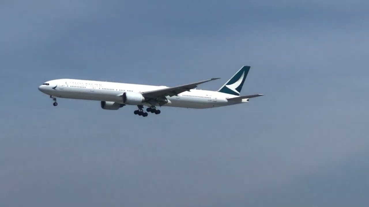 Cathay Pacific Boeing 777-300ER B-KPF landing at Tan Son Nhat airport.
