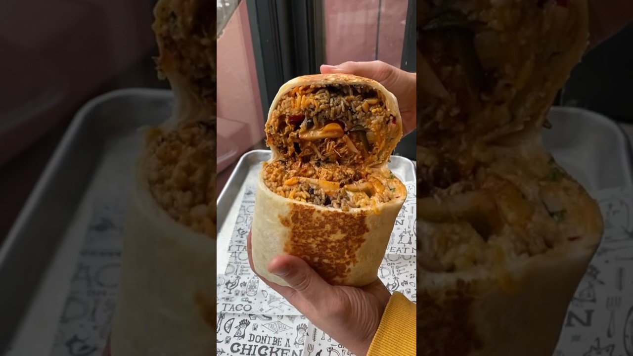 We ordered EVERY ingredient possible inside a burrito at Tacoria in New Jersey! 🌯💪🤤 #DEVOURPOWER