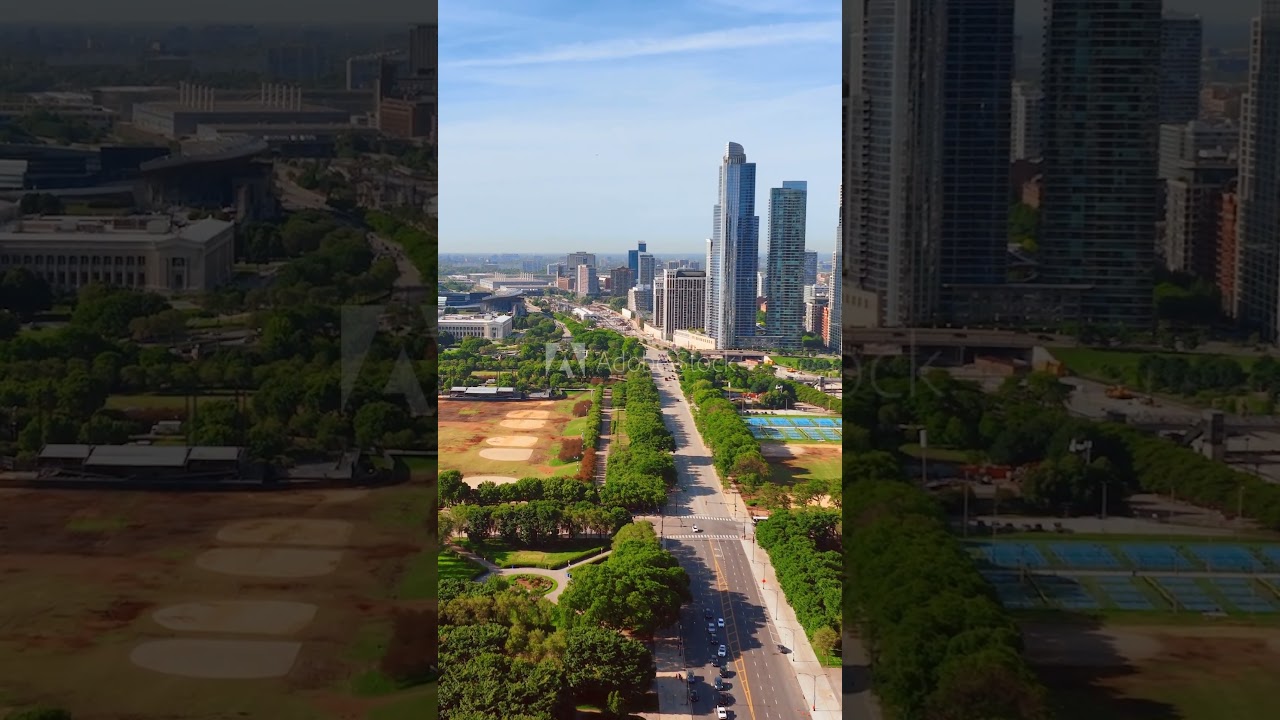 Aerial view flying over the Grant Park and Columbus drive, sunny in Chicago, USA. Vertical video....