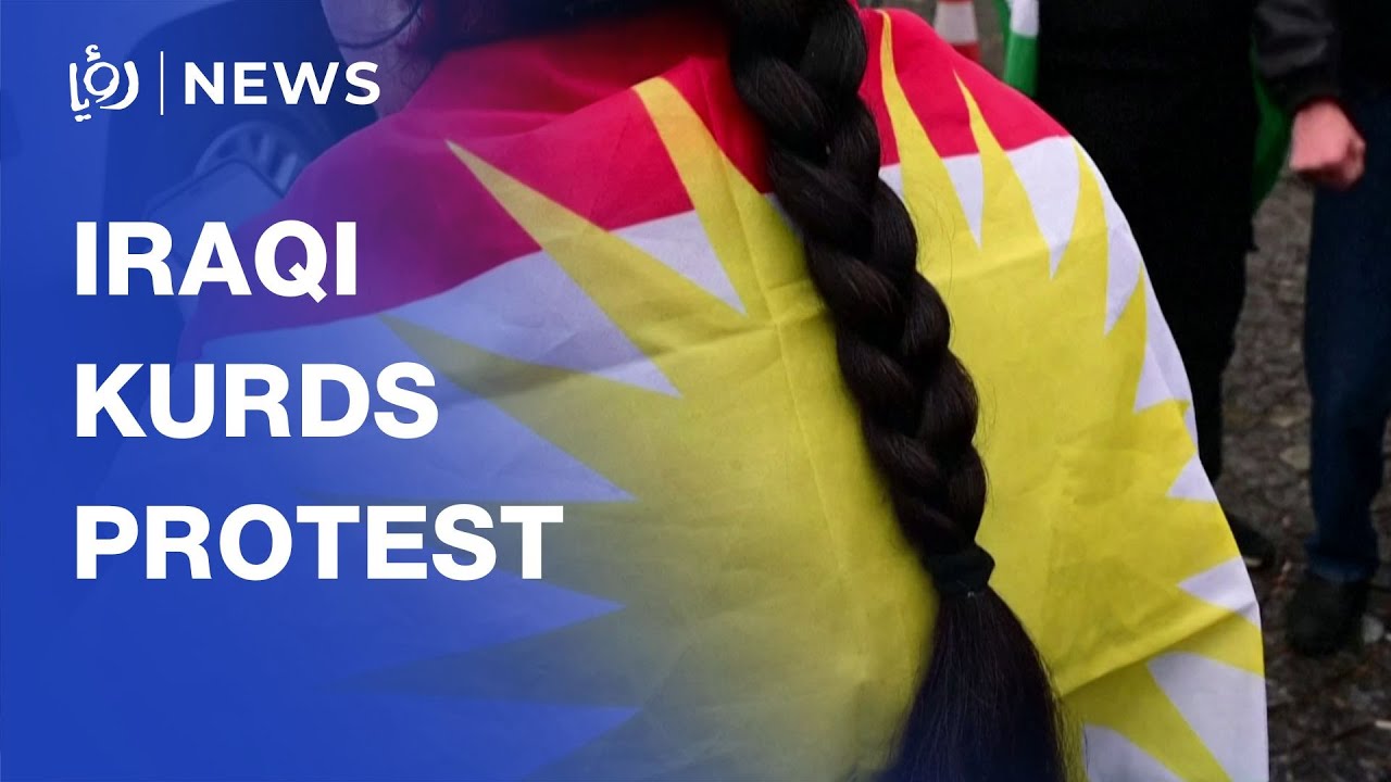 Iraqi Kurdish women braid hair at protest to show solidarity with Syrian Kurds