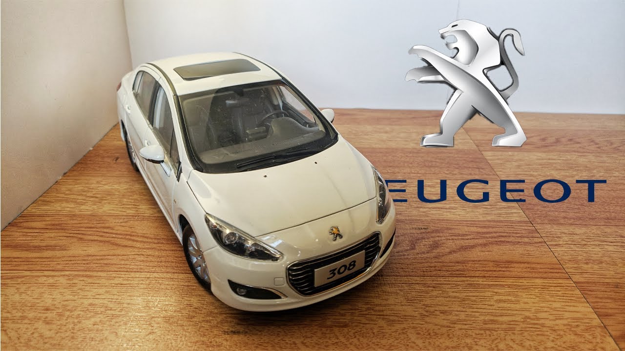 Unboxing of Peugeot 308 1:18 diecast scale model
