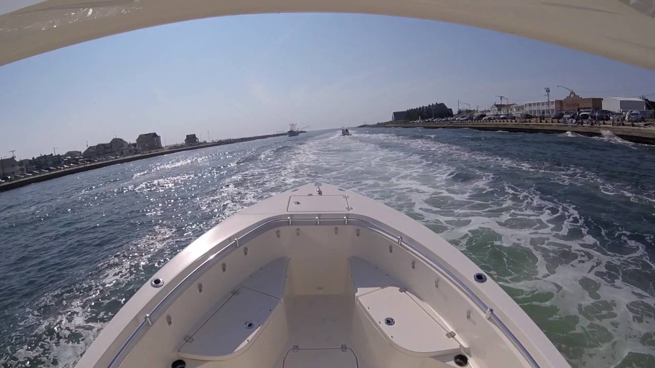 Cobia 237 Running Out of Manasquan Inlet (Front View)