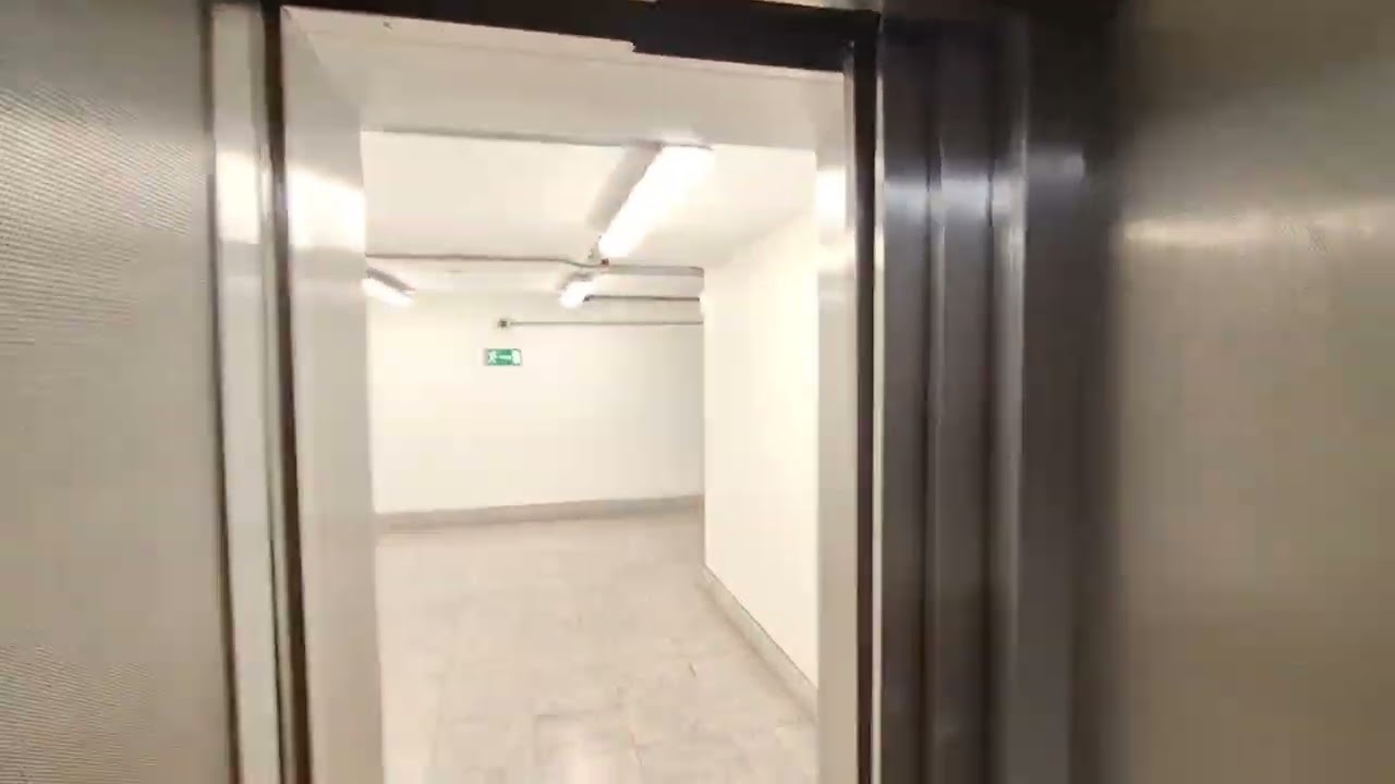 Thyssenkrupp Lifts at the Jubilee Place Mall, Canary Wharf (East Wintergarden)