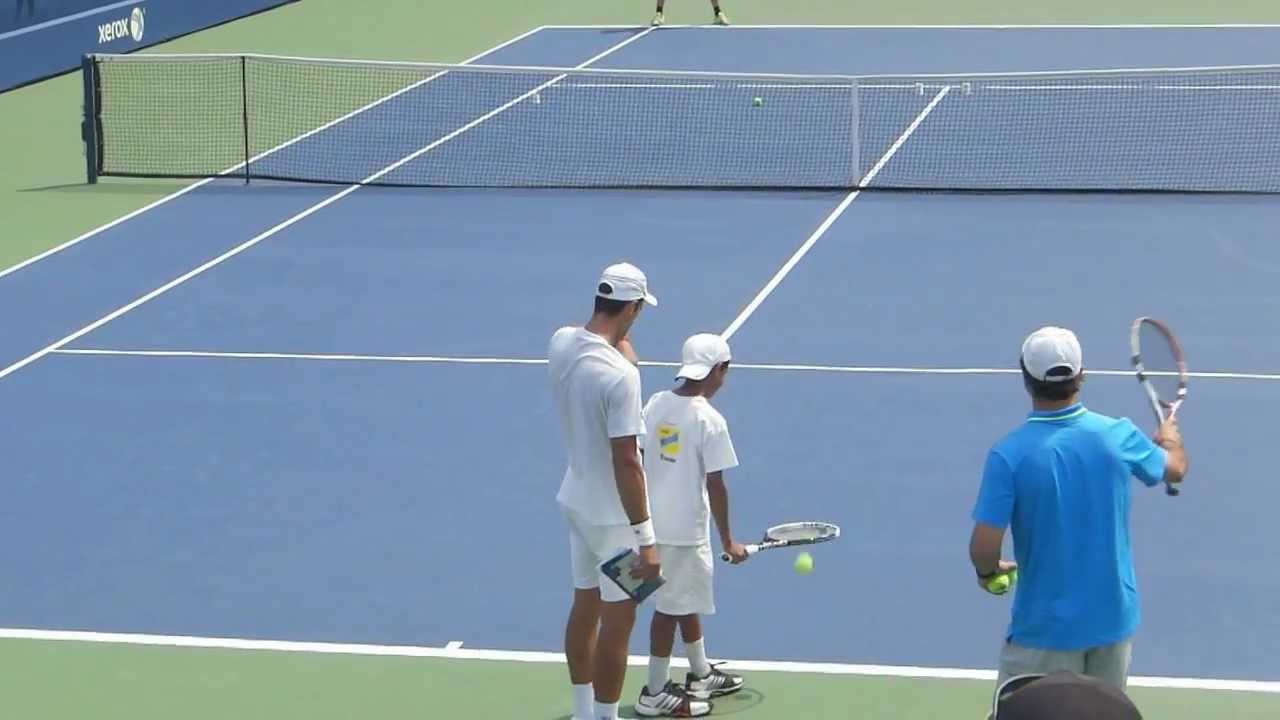 Novak Djokovic has fun with a fan (