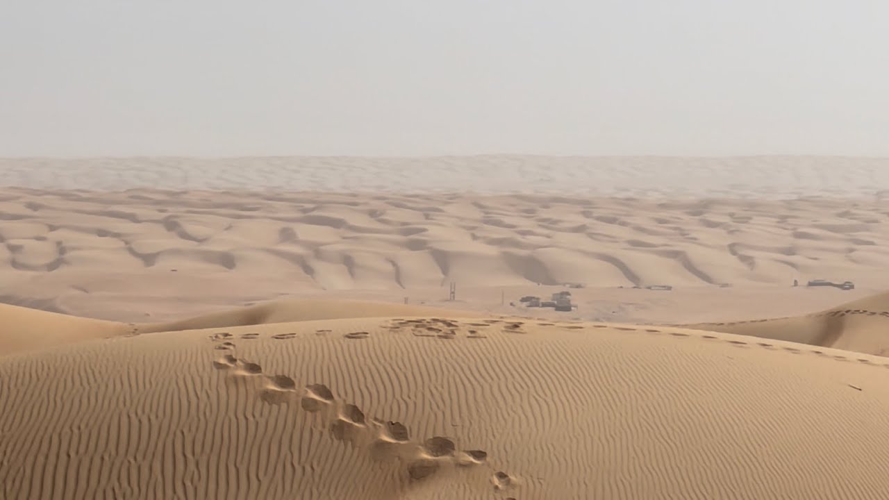 Excerpt: On the top of the highest sand dune in Sharqiya Sands desert, Oman.