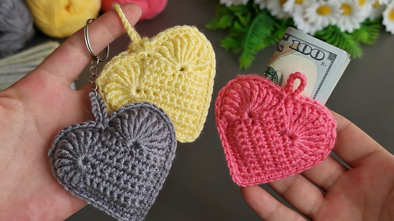 I made a great number of them and sold them all. 💰💰💰Crochet heart wallet keychain making. Worderful😇