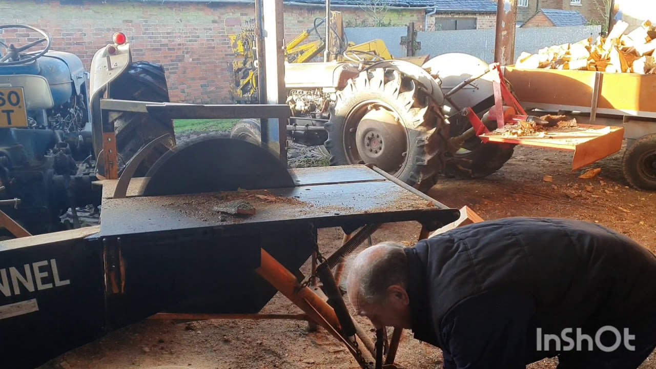 Fordson Super Major tractor, McConnel PTO sawbench, sawing beech into logs.