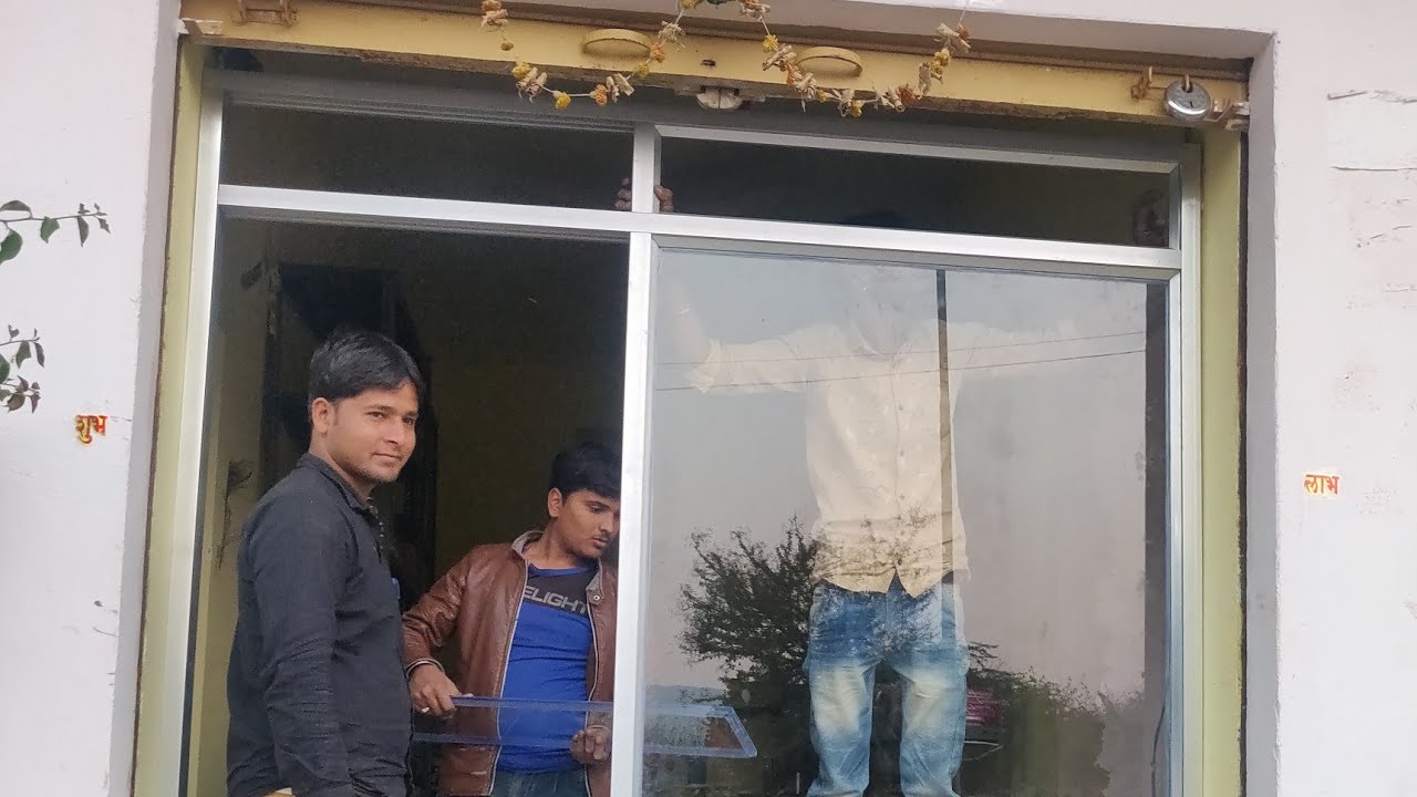 aluminium section में दरवाजा बनाने में कितना खर्चा आता है। door design with making price