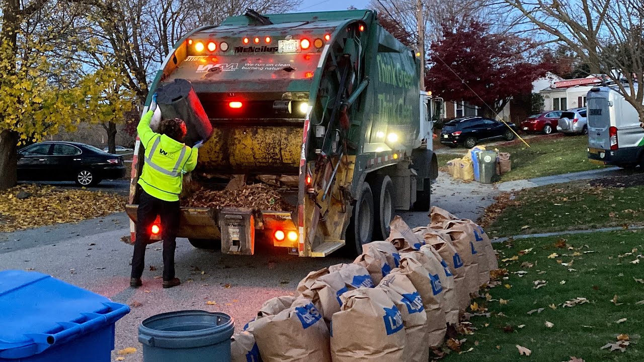 WM Garbage Truck Packing 6AM Leaf Season Bags