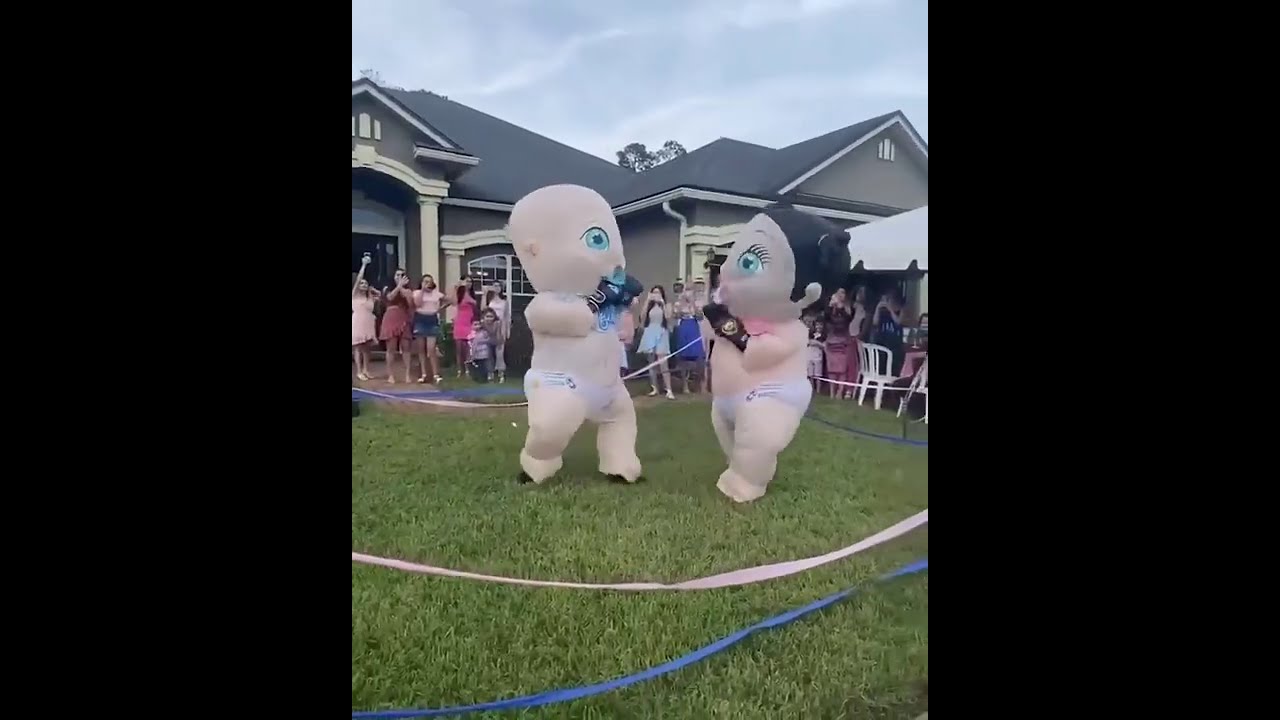 Relatives in Baby Costumes Stage Boxing Match for Gender Reveal Party in Jacksonville
