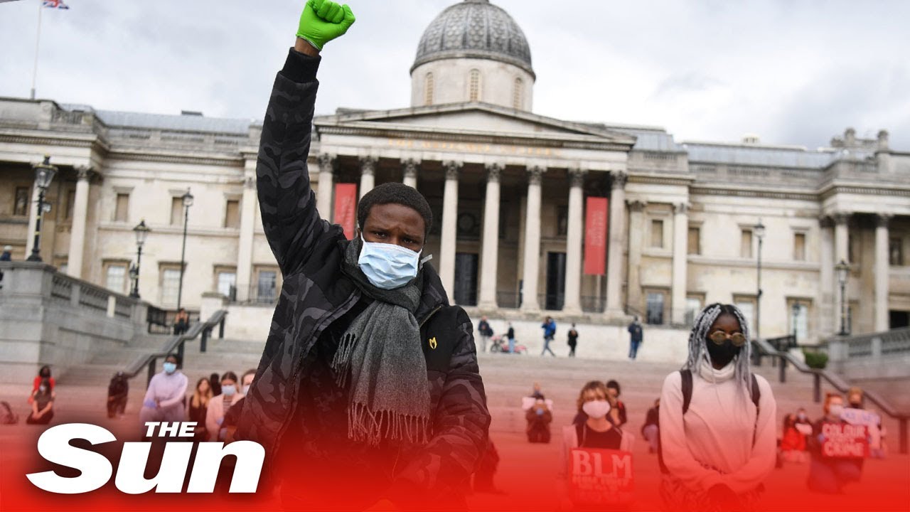 Black Lives Matter protesters march in Hyde Park and at Buckingham Palace as riot cops stand guard