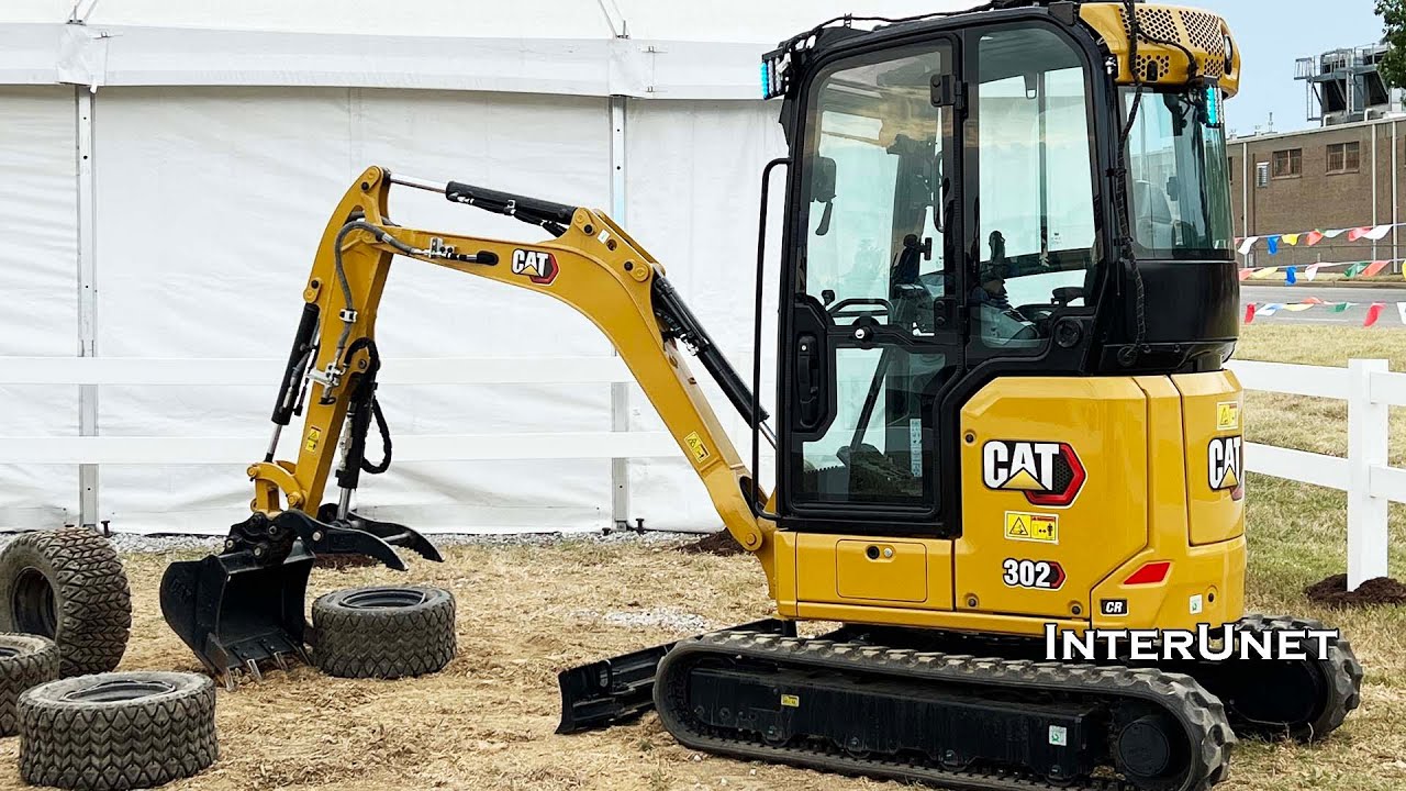 Remote controlled CAT 302 compact excavator demonstration