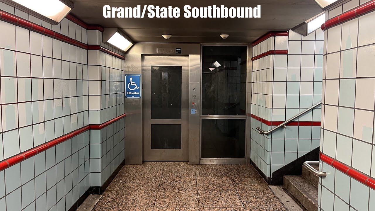 Glass Hydraulic Southbound Platform Elevator at Grand/State CTA Station in Chicago, IL