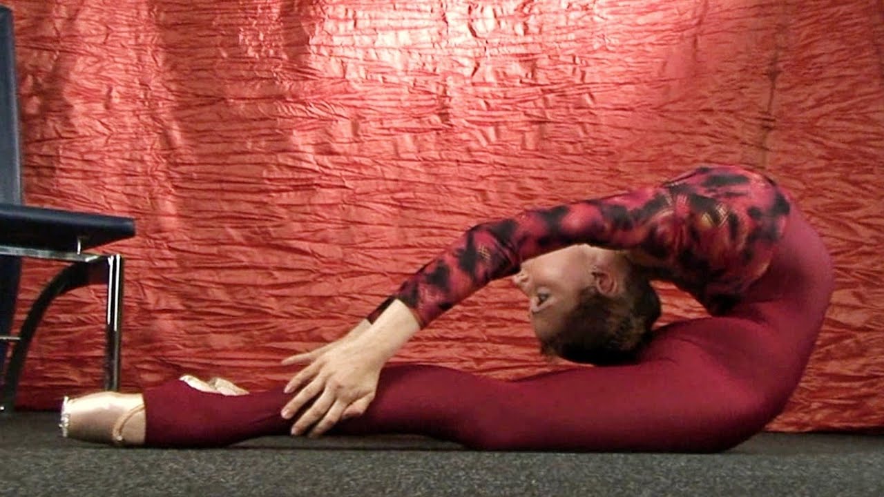 Stretching and flexibility of a ballerina in Pointe shoes.