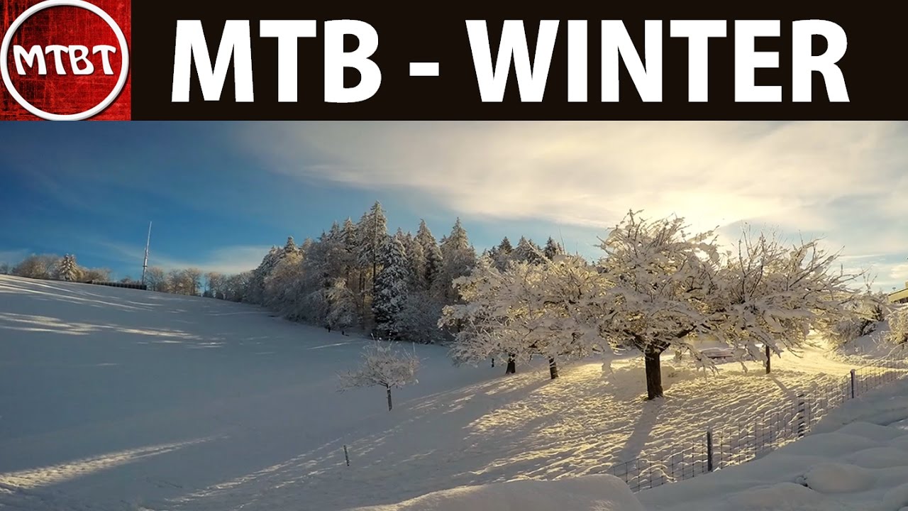 Mountain biking snowride in winter - MTB fun and winter training allenamento invernale