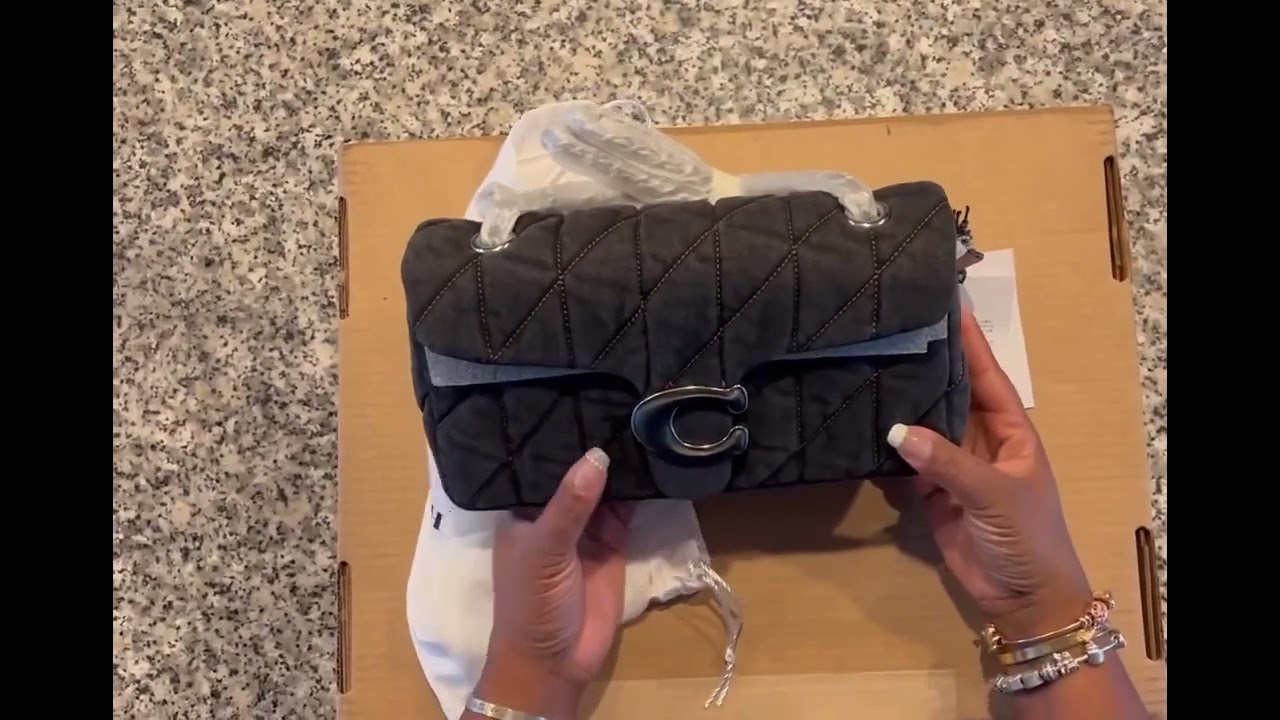 New @coach  This is the Black Denim Quilted Tabby in the size 26. Review + what fits coming soon