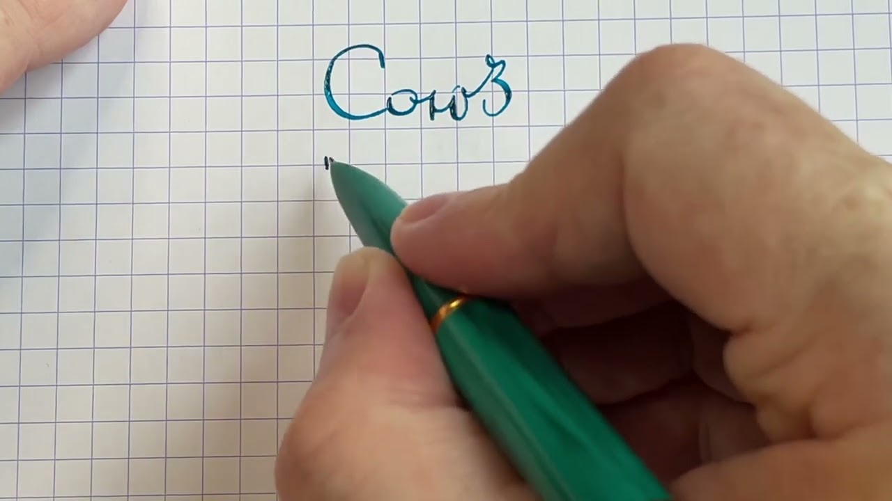 Fountain pen Soyuz Malakhit with gold nib writing sample.
