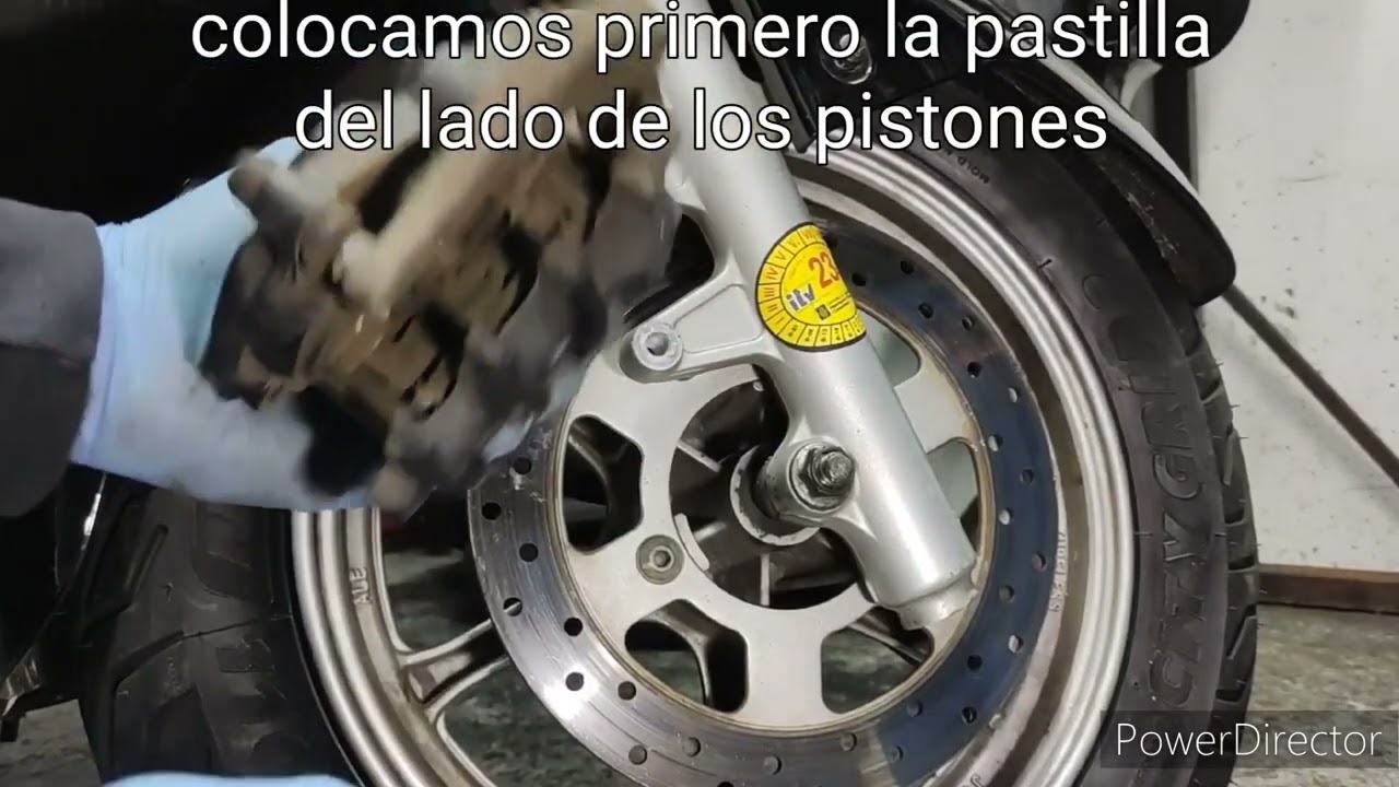 cambiar pastillas de freno delantero Suzuki burgman 125