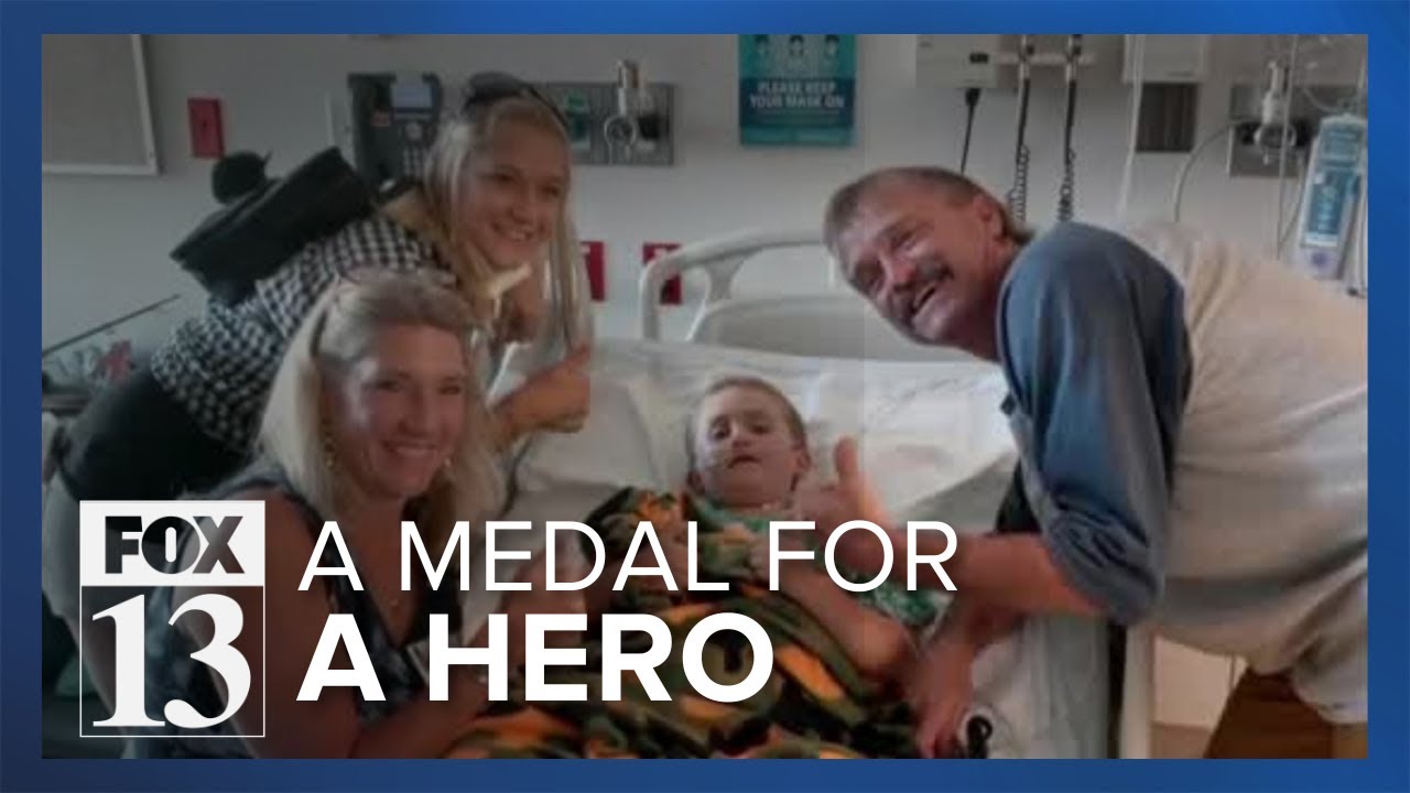 Utah man receives Carnegie Medal for saving boy from sinking truck