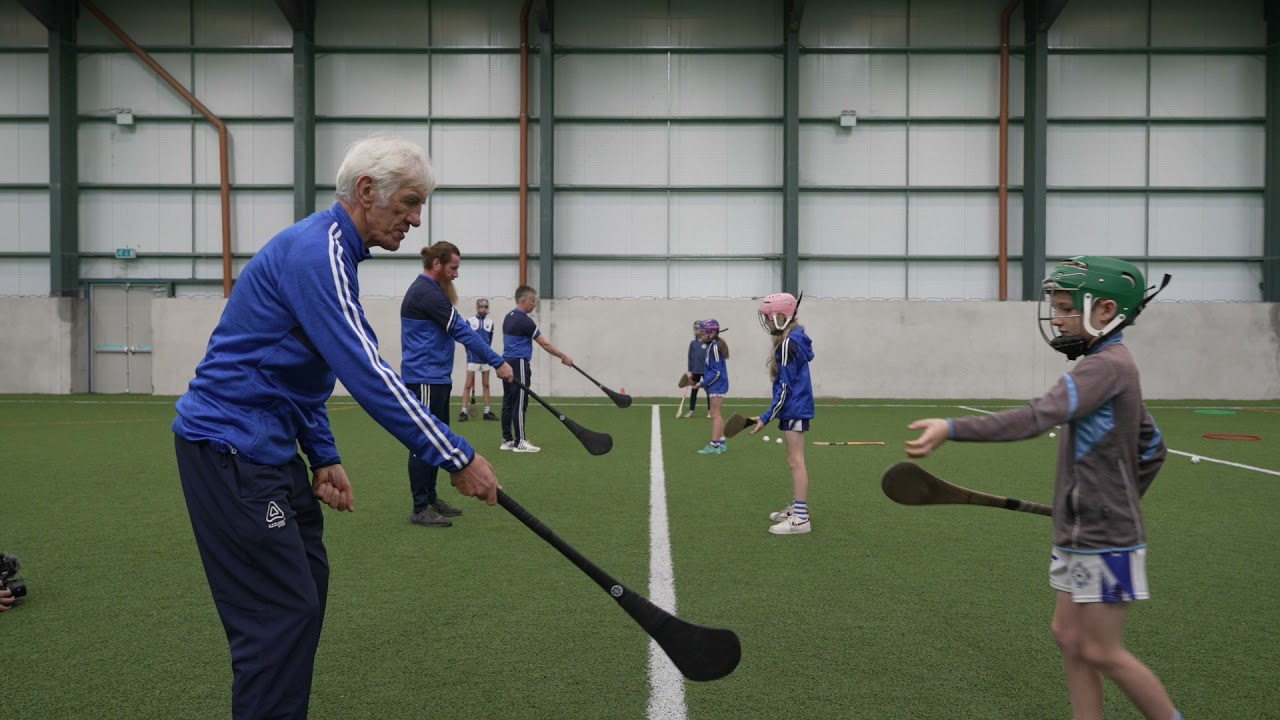 HURLING Striking ball from hand