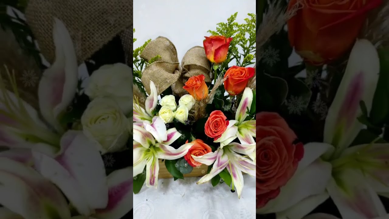 lets make a centerpiece with lilies an roses
