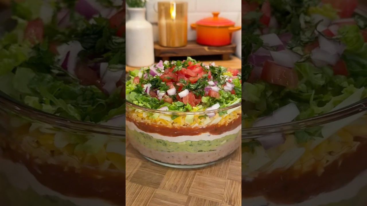 loaded 7 layer dip🌮🫘🥑🍅