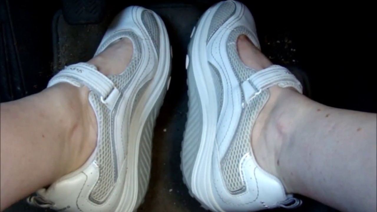 Sexy feet in white Skechers Sleek Fit