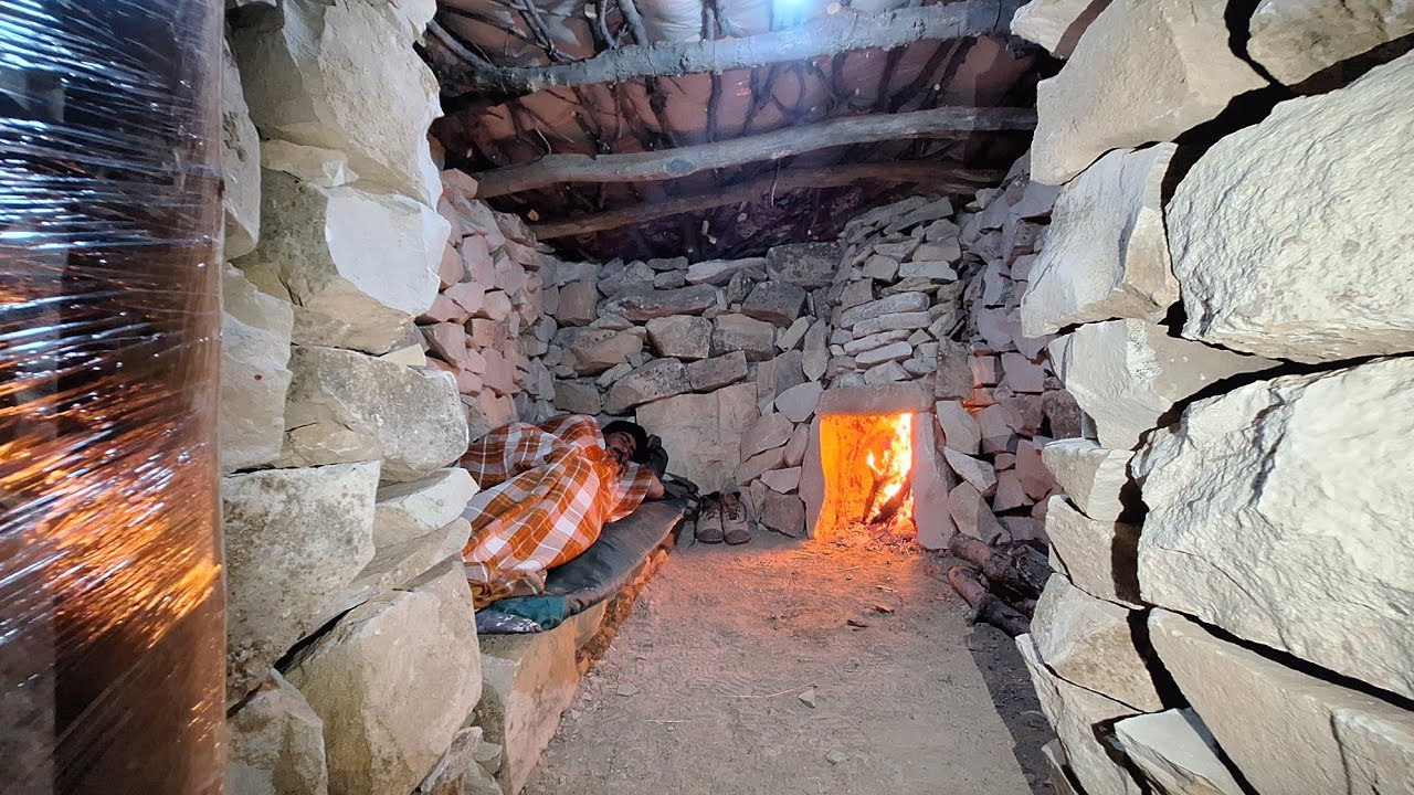 A Home in the Embrace of the Mountain: The Experience of Building a Stone Shelter  a Warm Fireplace