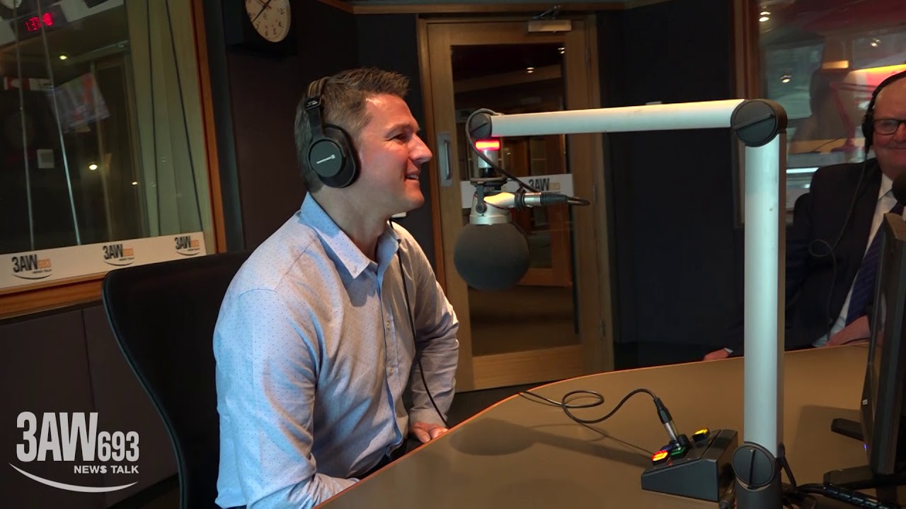 Byron gets his $10,000 for winning this year's 3AW Footy Tipping competition
