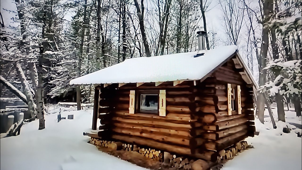 Overnight visit to a snowy log cabin.( No talking)