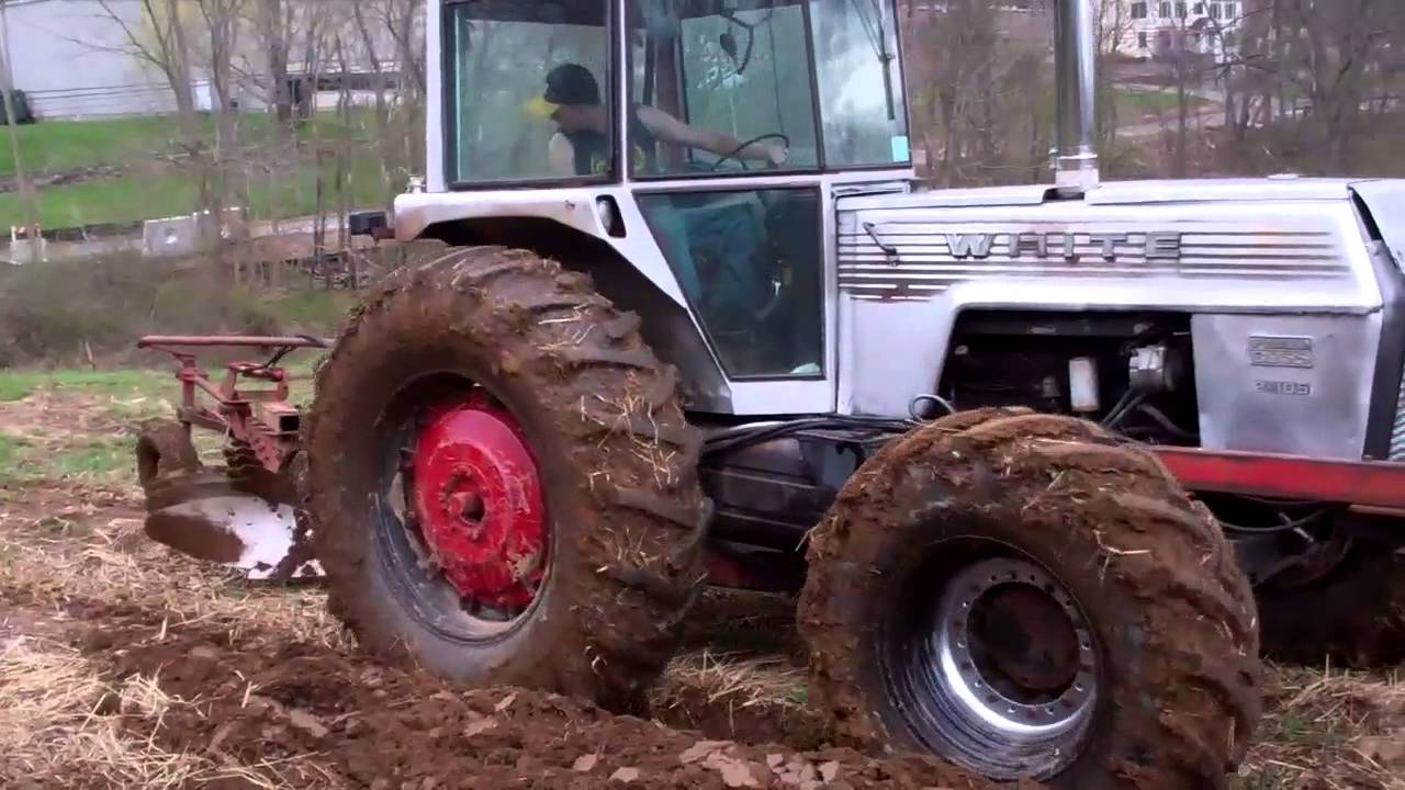 White 2-105 plowing with a four bottom International 540 plow