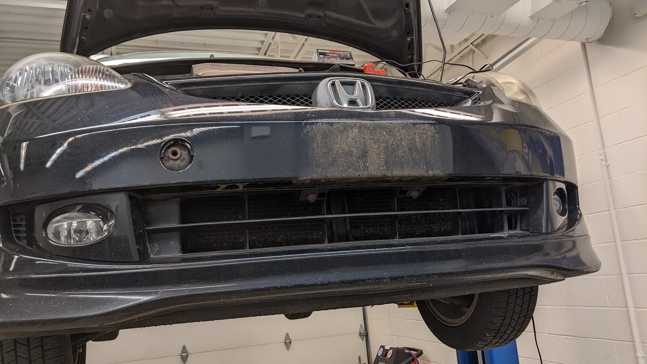 Where to hide a spare key on a 2008 Honda Fit car (for in case you get locked out)