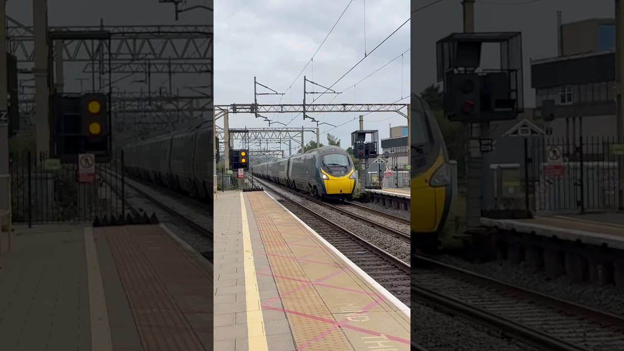 390005 shoots through Watford Junction