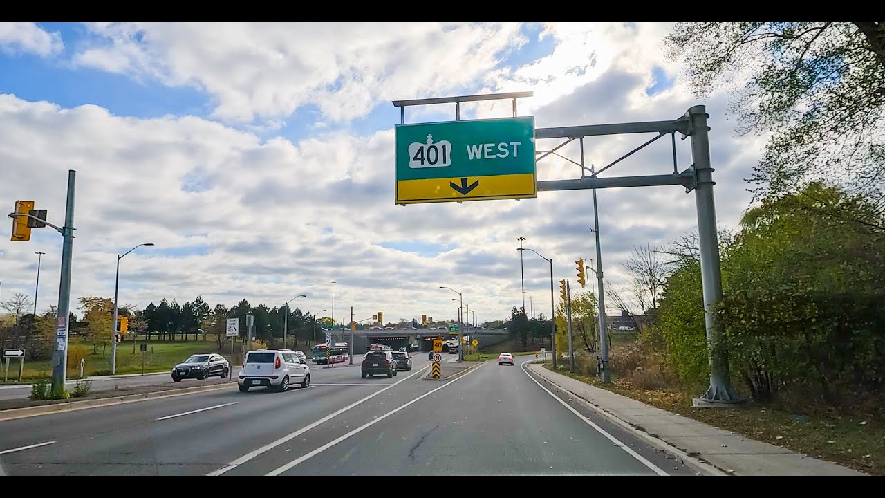 4K Drive to The International Centre via Hwy 401 from North York | Fall Clouds & City Views