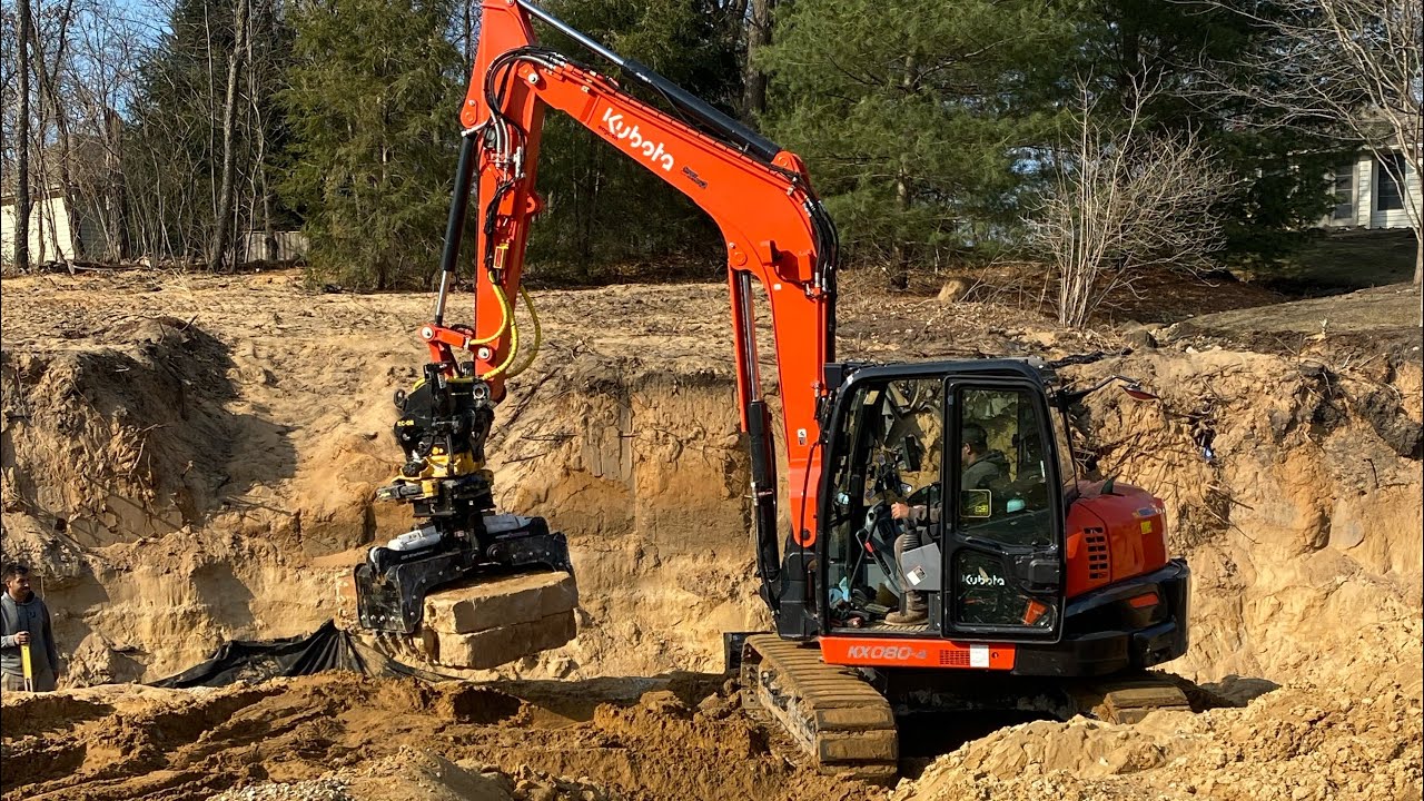 Setting Base Course Using a Kubota Kx080-4 with Engcon Tilt rotator and CMP Hydra Grapple,