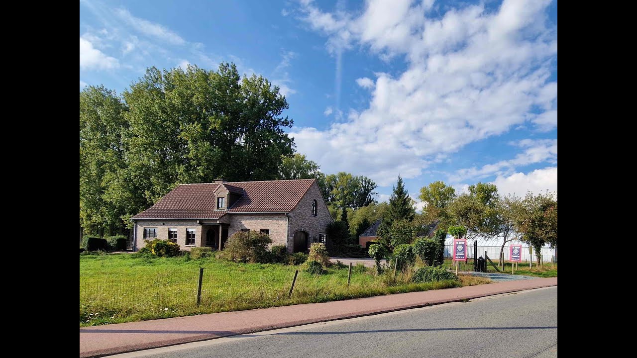 Vrijstaande woning met prachtig zicht over de velden + bouwlot OB + weilanden (6 ha)