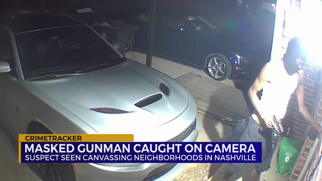 Masked gunman caught on camera