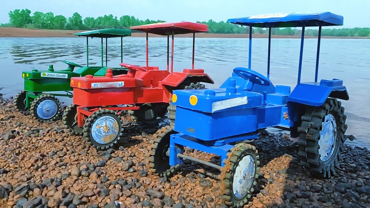 mini Swaraj tractor stuck in mud jcb Loading parle g biscuits help tractor Video
