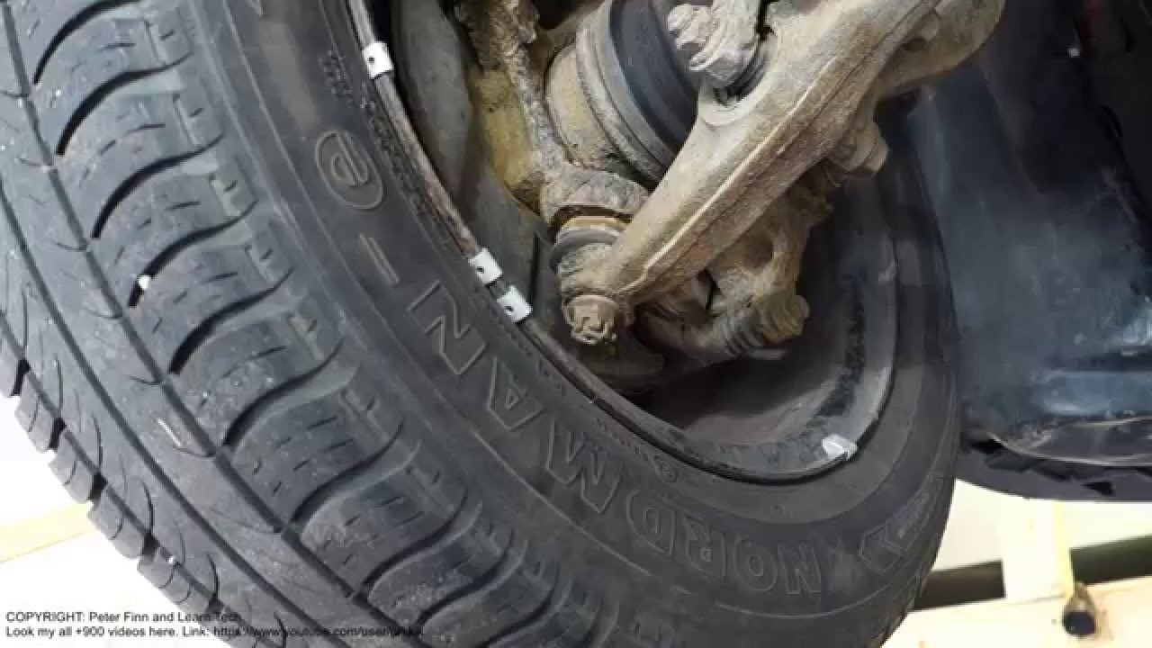 How to check inner drive shaft boot in car